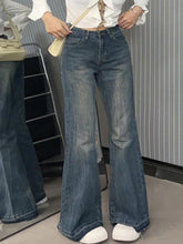 Vintage High Rise Raw Trim Flare Jeans